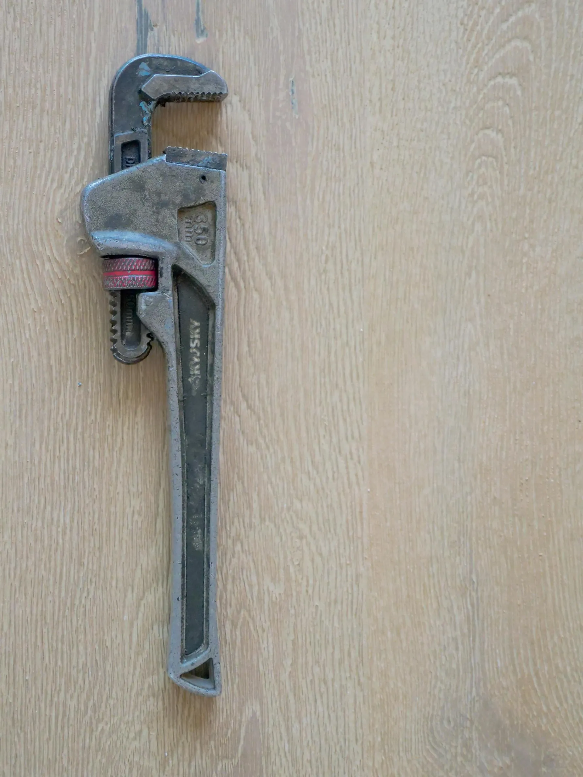 Stilson pipe wrench on a workbench